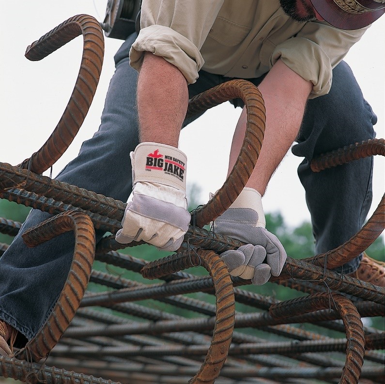 Worker Grabbing Iron